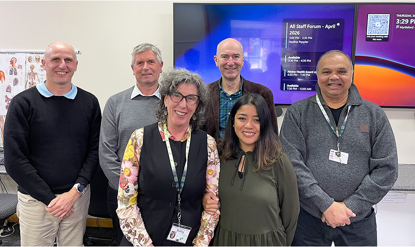 Cameron Butler with Alpine Health Management team standing together with board chair Cameron Oxley Cameron Butler with Alpine Health Management team standing together with board chair Cameron Oxley