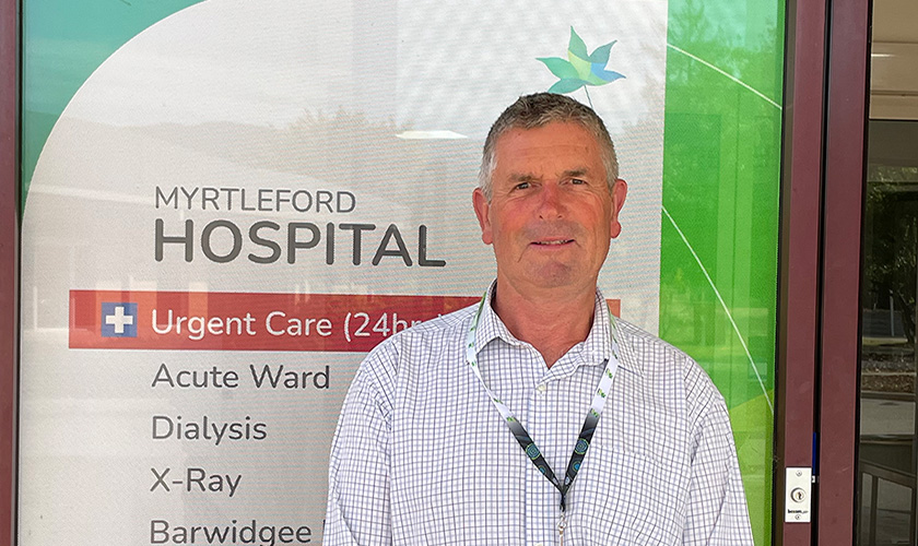 man standing in front of myrteford hospital entrance man standing in front of myrteford hospital entrance